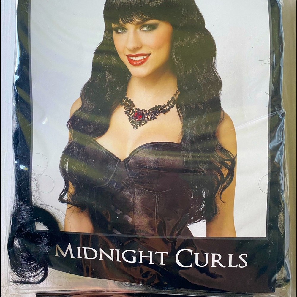 Midnight curls long wig. Tried on but never worn